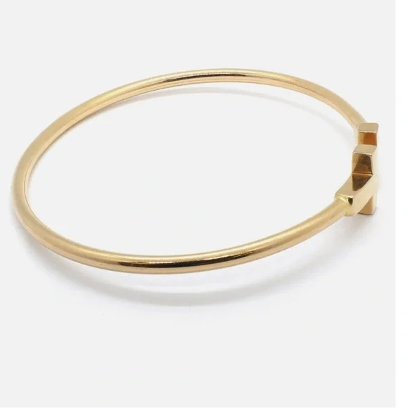 GOLD DOUBLE T WIRE OPEN CUFF BRACELET
